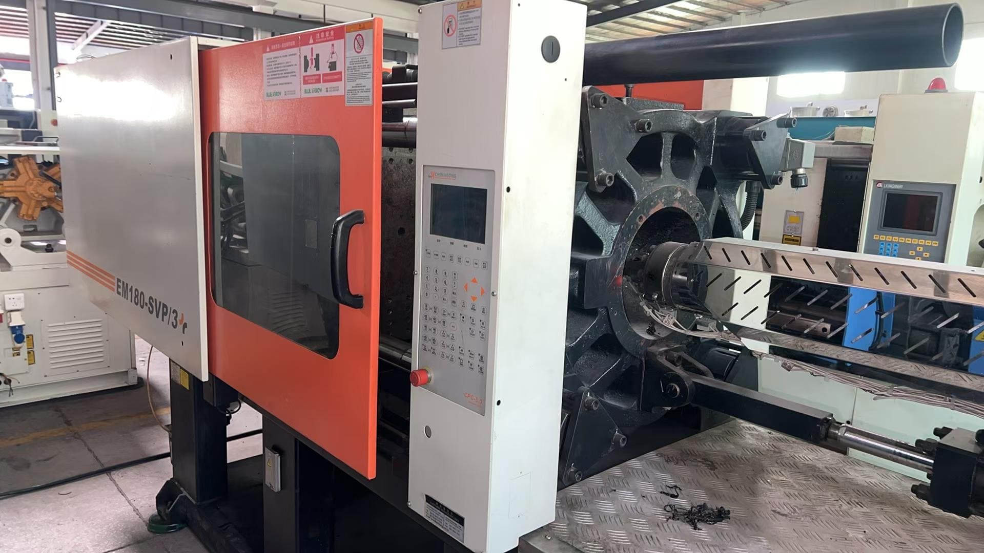 Used 180 Ton EM180-SVP-3 Injection Molding Machine | A/B/C-Screw 46/52/60mm, Max PS Shot Weight 598g