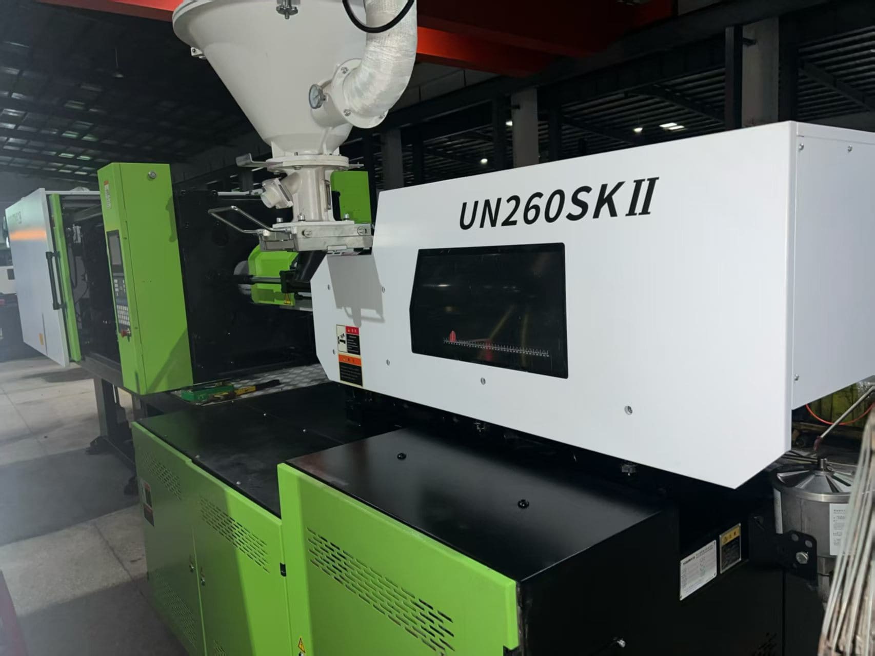 Used 260 Ton YIZUMI UN260SKII Injection Molding Machine | A/B/C-Screw 53/60/68mm, Max PS Shot Weight 885.4g