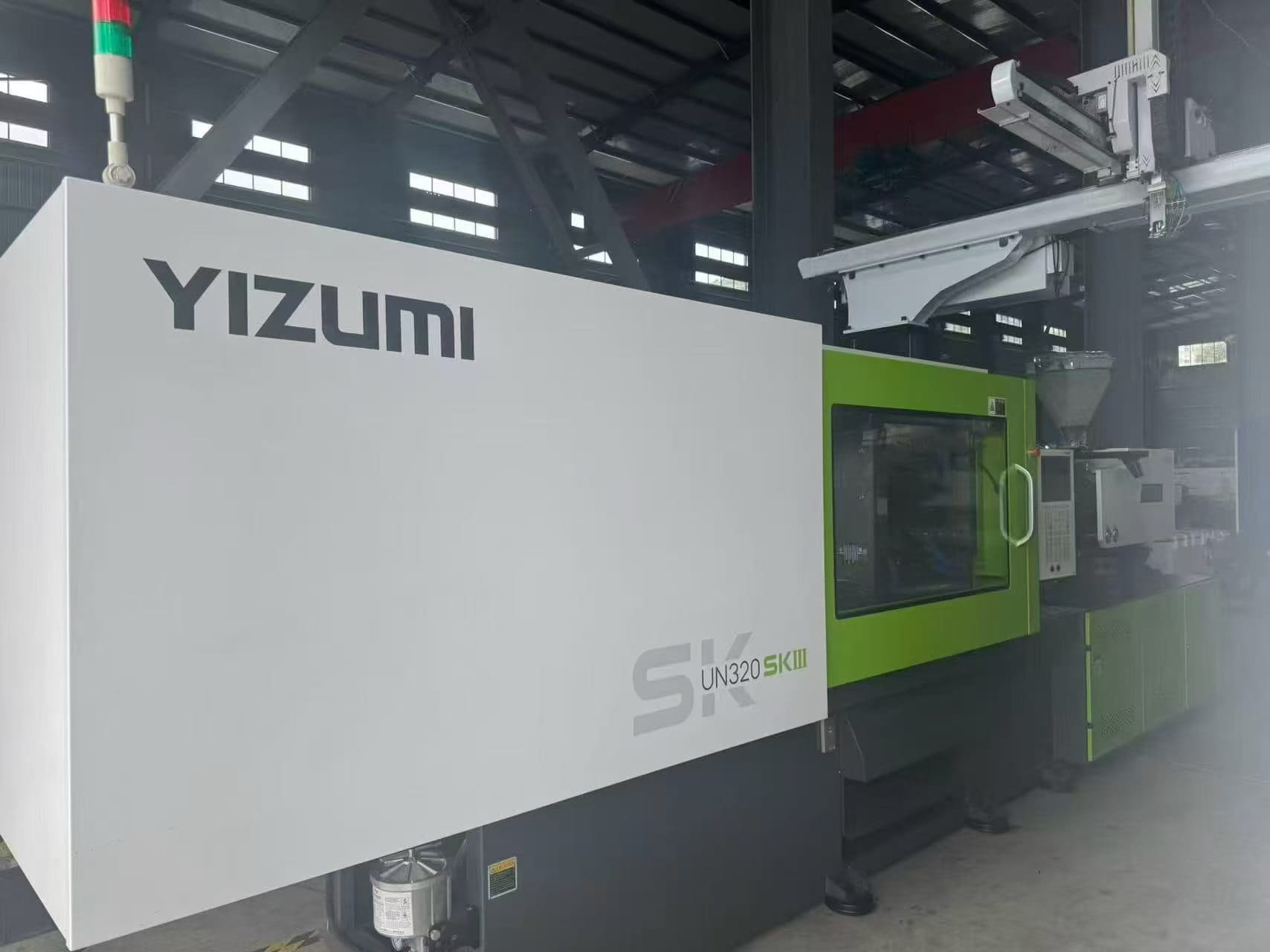 Used 320 Ton YIZUMI UN320SKIII Injection Molding Machine | A/B/C-Screw 60/65/70mm, Max PS Shot Weight 1044.4g